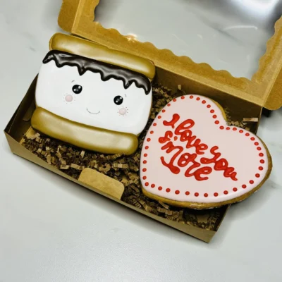 "I love you s'more" cookie next to a s'more shaped cookie