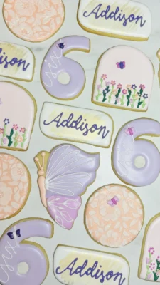 Butterfly themed sixth birthday sugar cookies