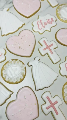 Baptism cookies in pinks